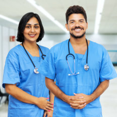 two nurse smiling